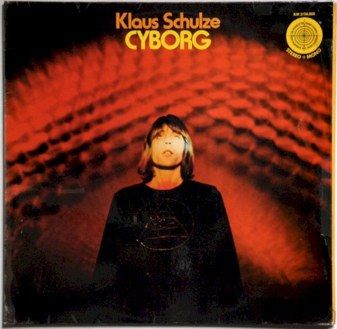 The 1973 Ohr first pressing of Cyborg. Schulze stands in black against a swirling red and black background, looking up