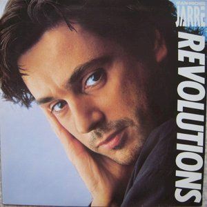Revolutions 1988년 프랑스 드레퓌스 초판 LP 표지. 손으로 얼굴을 괸 장 미셸 자르의 얼굴이 화면을 채우고, 오른쪽에 세로로 JEAN-MICHEL JARRE 와 REVOLUTIONS 가 크게 적혀 있다